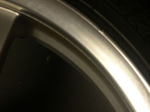 1997 Ford Probe - A close-up view of a vehicle's alloy wheel and tire, a watermark from Supermotors.net.