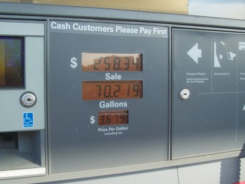 1994 Ford F-150 - Gas pump display shows sale total, gallons dispensed, and price per gallon including tax.