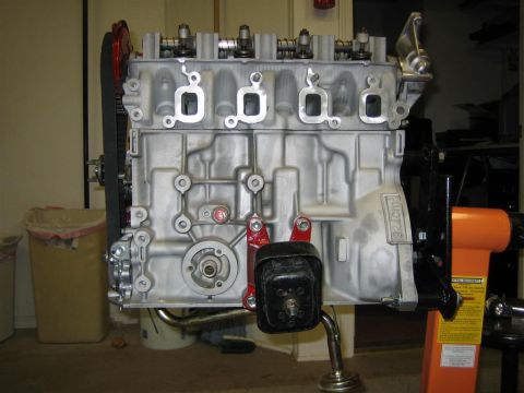 1987 Suzuki Samurai - Engine block with visible part numbers and mounting hardware.