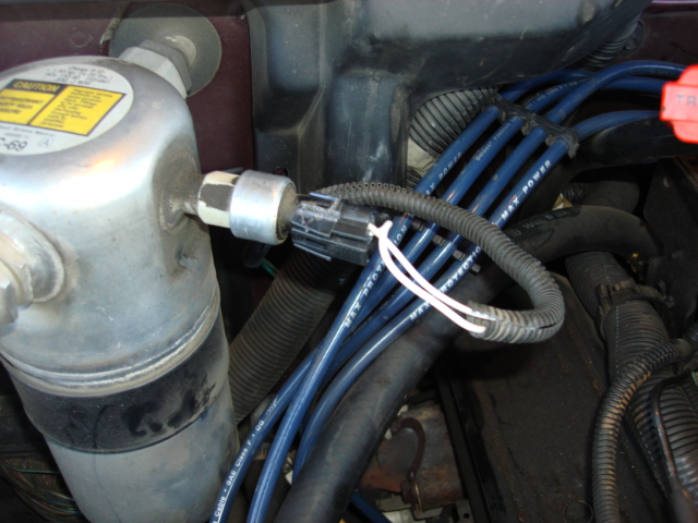 A fast clip and solder and heat shrink the new connector in place and recove the wires with the plastic sprial wrap and i got cold air once again.