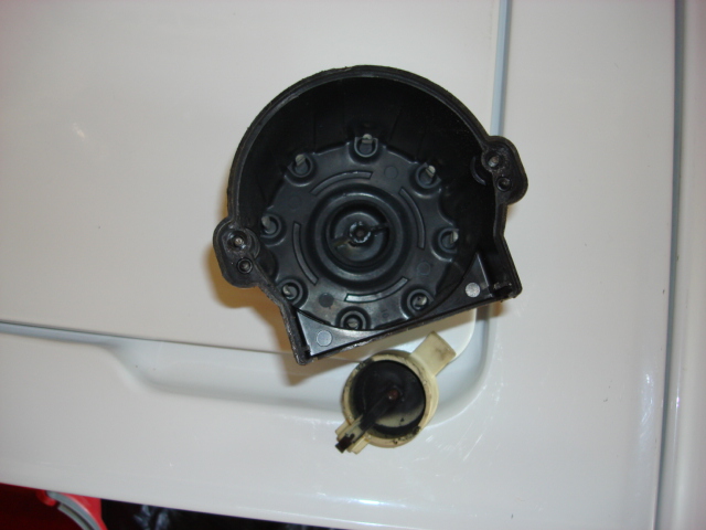 you can see the rotor is cooked and the bottom of the cap is in poor shape as well.