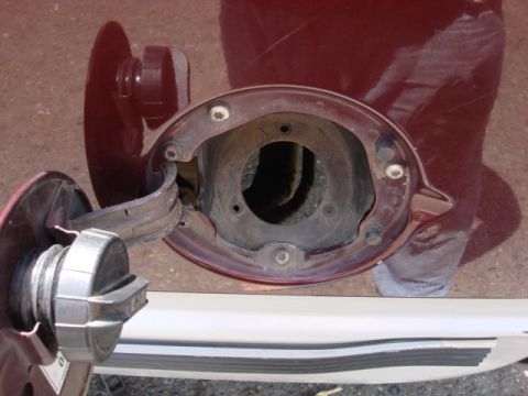 1983 Ford Bronco - make sure you remove the filler neck 8mm bolts. this allows the tank to drop some so it will come out easier.