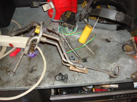 1983 Ford Bronco - the old pump was out in a few seconds.