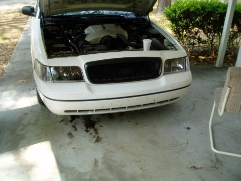 2000 Ford Crown Victoria - both in