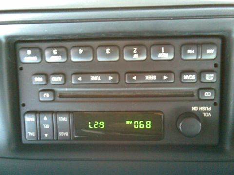 2003 Ford Crown Victoria - elwood came with an am/fm "brick" radio, now it has a Ford am/fm/cd