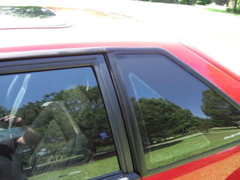 1967 Ford Mustang - The "Mustang" badge on the rear quarter window indicates this is a 1993 model, not a 1967.