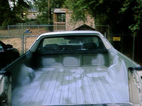 1976 Ford Ranchero - Rear view of a 1976 Ford Ranchero pickup truck bed with a white liner.