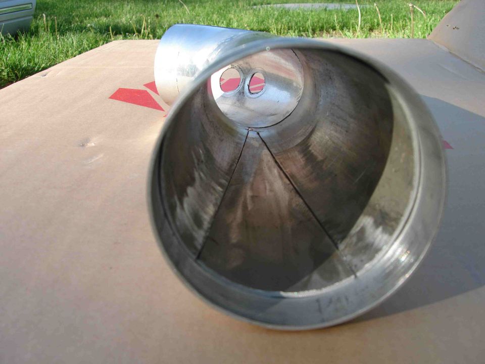 Inside bore of fabricated aluminum intake tube showing seams and two sensor ports