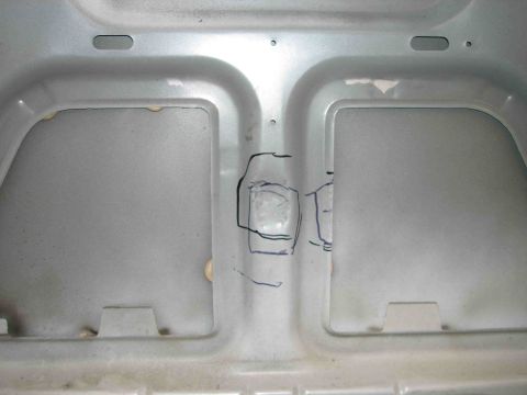1997 Lincoln Town Car - Underside of a car hood, showing structural reinforcements and some hand-drawn markings.