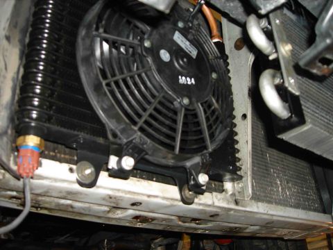 1997 Lincoln Town Car - Transmission cooler fan and radiator assembly, likely an aftermarket upgrade.