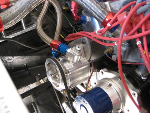 1979 Ford Bronco - Engine bay details with braided fuel lines and electrical wiring visible.