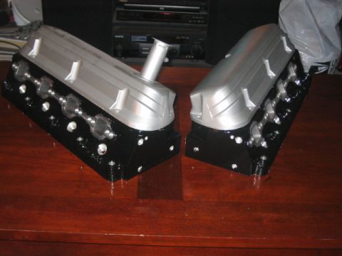 1991 Ford Bronco - Two engine blocks are displayed on a table, possibly for a custom build or restoration project.