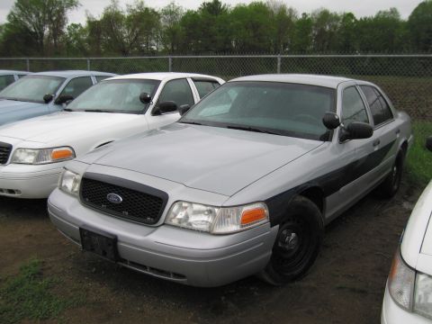1991 Ford LTD Crown Victoria - This police car appears to be a Ford Crown Victoria, likely from the early 2000s, not a 1991 model as suggested.
