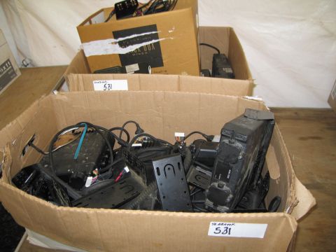 1991 Ford LTD Crown Victoria - Boxes of electronic parts and cables are stored together, with labels indicating 'SEABANK 531'.