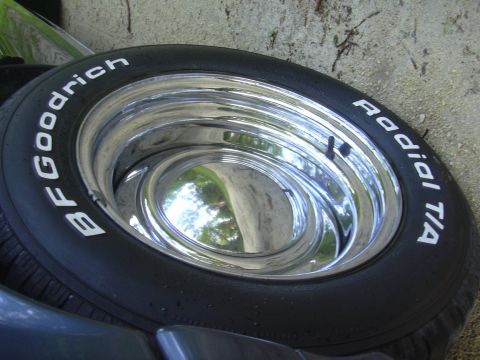 1996 Ford Crown Victoria - Close-up of a BFGoodrich Radial T/A tire on a chrome wheel.