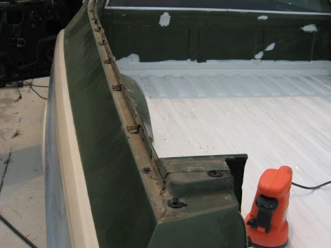 1973 Ford Ranchero - Restoration work on a 1973 Ford Ranchero bedliner, with an orbital sander nearby.