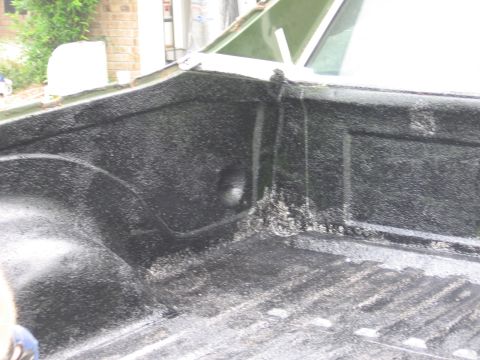 1973 Ford Ranchero - Black spray-on bed liner applied to the bed of a pickup truck.