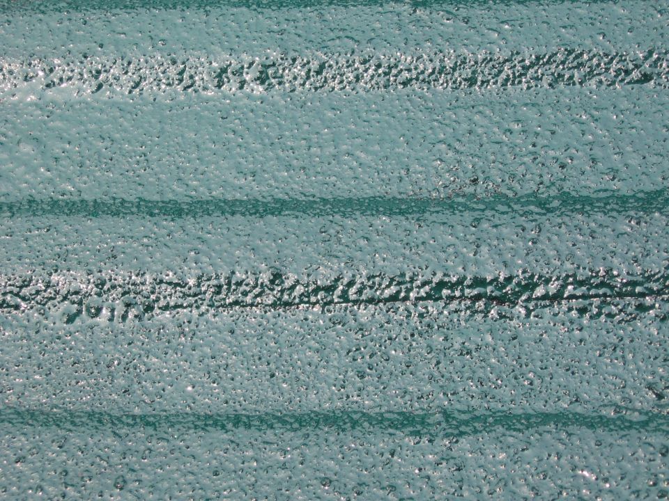 Green bedliner with horizontal ridges and textured surface