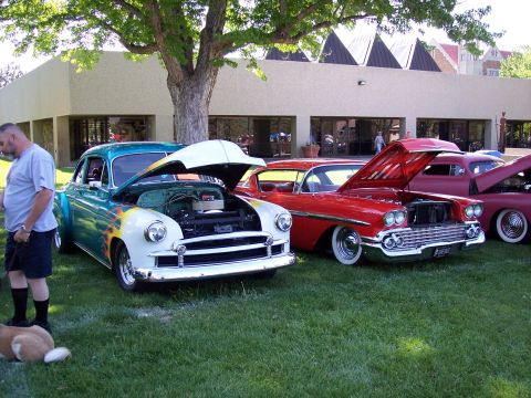 1972 Ford Ranchero - Several classic cars are displayed on a grassy lawn under a large tree.