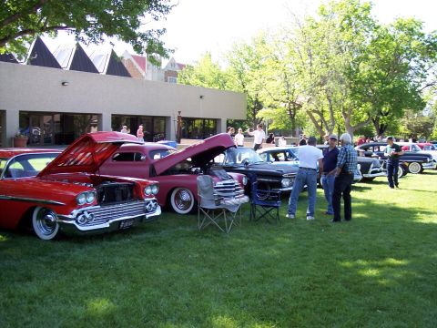 1972 Ford Ranchero - Attendees examine classic automobiles displayed on a grassy lawn during a special interest car show.