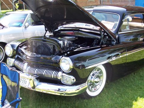 1972 Ford Ranchero - This 1950 Mercury Custom has its hood open, showing the engine bay and front grille.