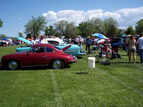 1972 Ford Ranchero - Cars on display at an outdoor event under a partly cloudy sky.