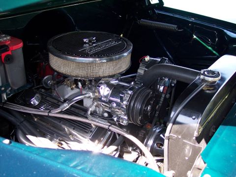 1972 Ford Ranchero - Close-up of a V8 engine with chrome accents and an air filter, likely from a custom build.