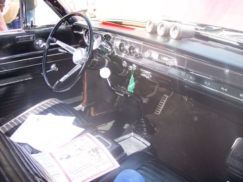 1972 Ford Ranchero - Classic car interior features a floor-mounted shifter and a "Little Trees" air freshener.