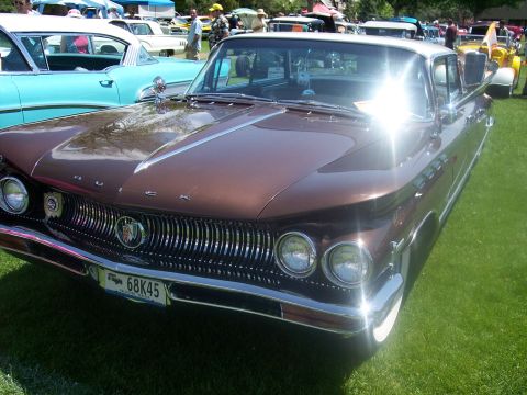 1972 Ford Ranchero - Front view of a 1959 Buick LeSabre at a car show, with other vehicles in the background.