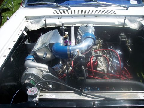 1972 Ford Ranchero - The engine bay features a supercharger and custom intake system, suggesting performance modifications.