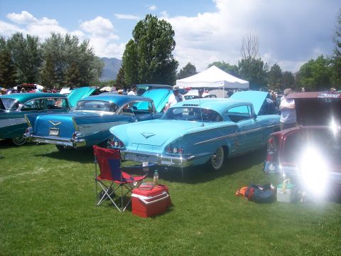 1972 Ford Ranchero - Multiple classic cars are on display at an outdoor event.