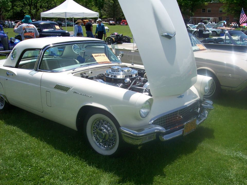 White 1957 Ford Thunderbird, 3q-front view, hood open, wire wheels