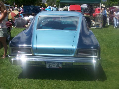 1972 Ford Ranchero - Rear view of a 1970 AMC Matador coupe at a car show, with other vehicles and people in the background.