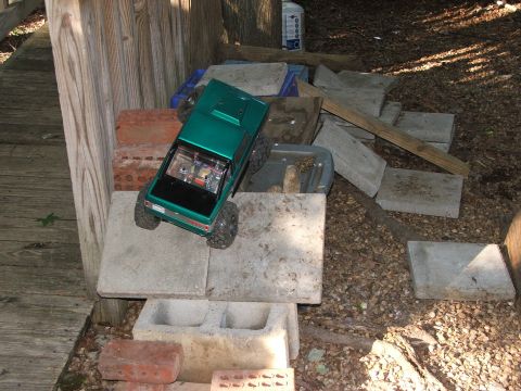 1996 Ford Bronco - Remote control truck navigating an obstacle course made of bricks and concrete.