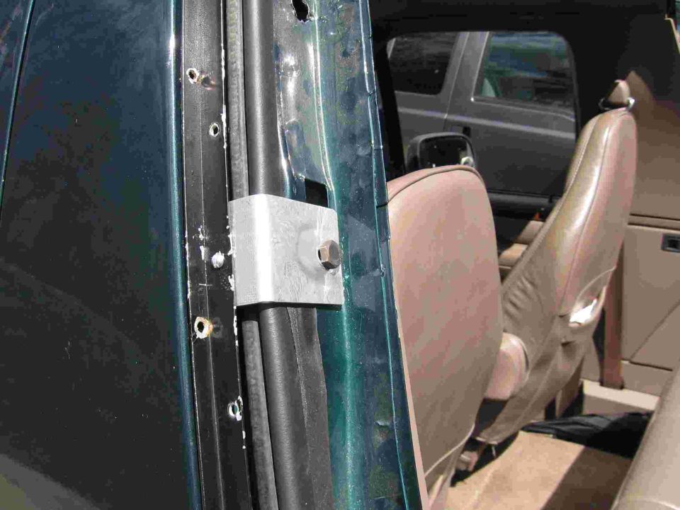 The side cab bracket dimensions are almost the opposite of the top mounts. Bolt hole location in all brackets was determined by the snap location on the cab mount channels.