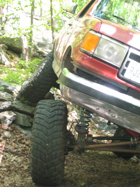 1990 Ford Bronco - This 1990 Ford Bronco navigates a challenging rocky trail, its off-road capabilities.