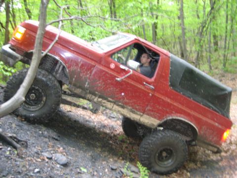 1990 Ford Bronco - This 1990 Ford Bronco navigates a challenging off-road trail.