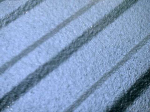 1976 Ford Ranchero - Tire tread detail with diagonal grooves. Supermotors.net logo is present.