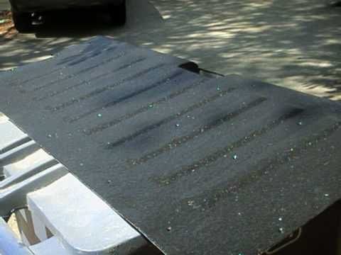 1976 Ford Ranchero - The image shows a close-up view of a truck bed liner.