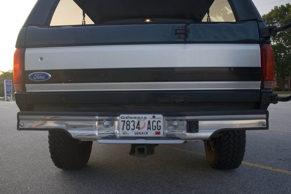 Rear close-up of a dark green Ford Bronco with Georgia plate 7834 AGG