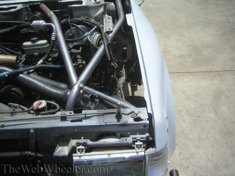 Tube-chassis engine bay with radiator support and steel tubing