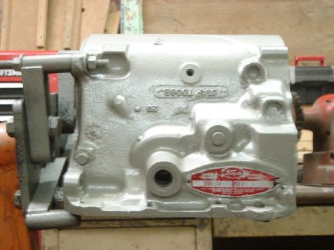 1962 Ford Thunderbird - A close-up view of a Ford engine component, identified by a red label indicating '390 V'.