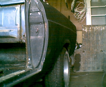 1966 Ford Ranchero - This vehicle appears to be undergoing restoration, with visible rust and missing body panels.