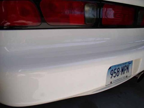 1996 Ford Probe - Rear view of a 1996 Ford Probe GT, showing the taillight and license plate.