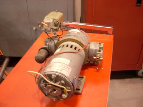 1992 Ford Bronco - This industrial motor assembly features a main motor, a control box, and various electrical connections.