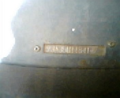 1973 Ford Ranchero - A close-up view of a vehicle identification number plate.
