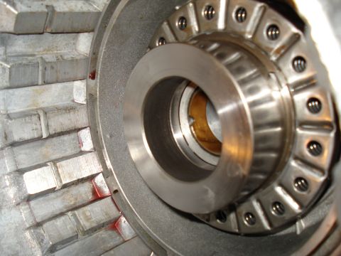 1984 Ford Bronco - Transmission component detail showing a bearing and internal fins with red markings.
