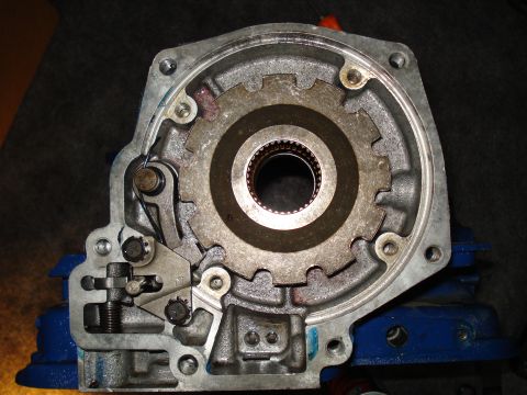 1984 Ford Bronco - Internal components of a transmission oil pump assembly are shown, with gears and a valve mechanism.