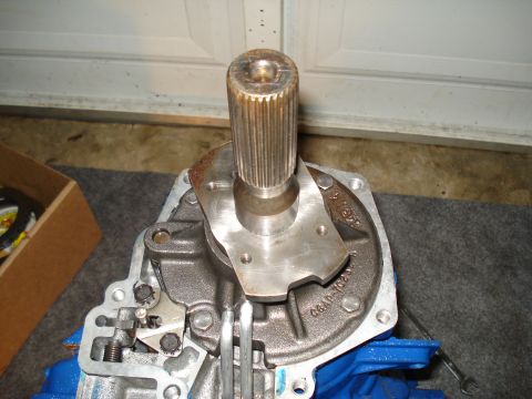 1984 Ford Bronco - Close-up of a transmission component, likely a pump housing, with a splined input shaft visible.
