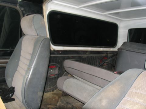 1978 Ford Bronco - Interior view of a 1978 Ford Bronco, highlighting the seating and window details.
